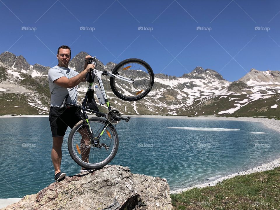 man on a bike in the mountains