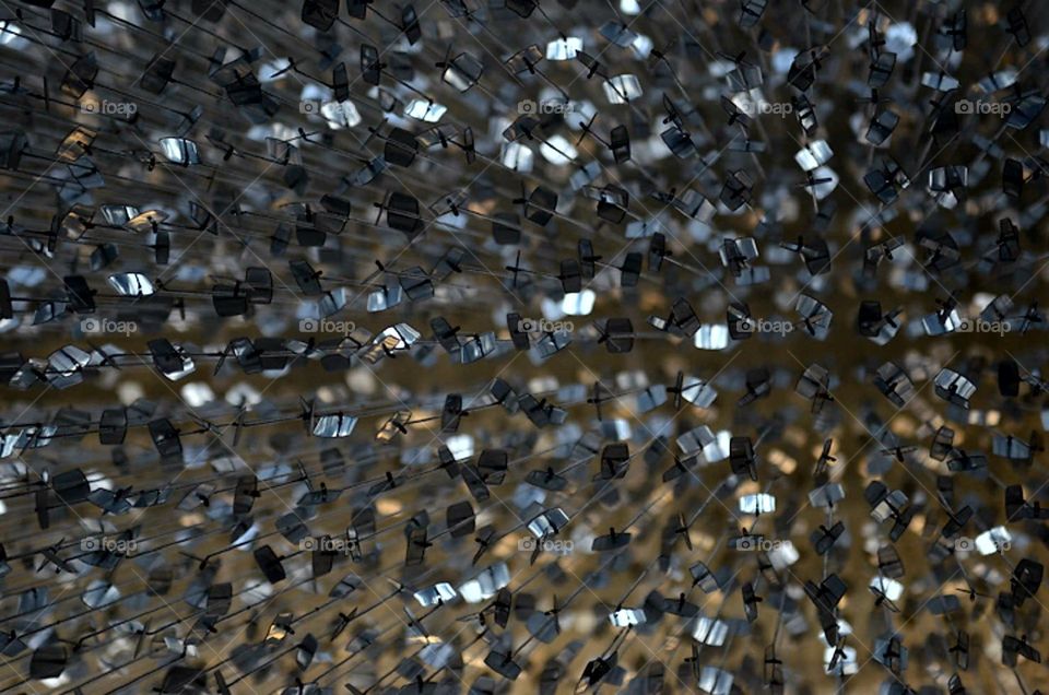 A display of dog tags on the ceiling for fallen heroes of every major war at the veteran's park, Fayetteville, N.C.