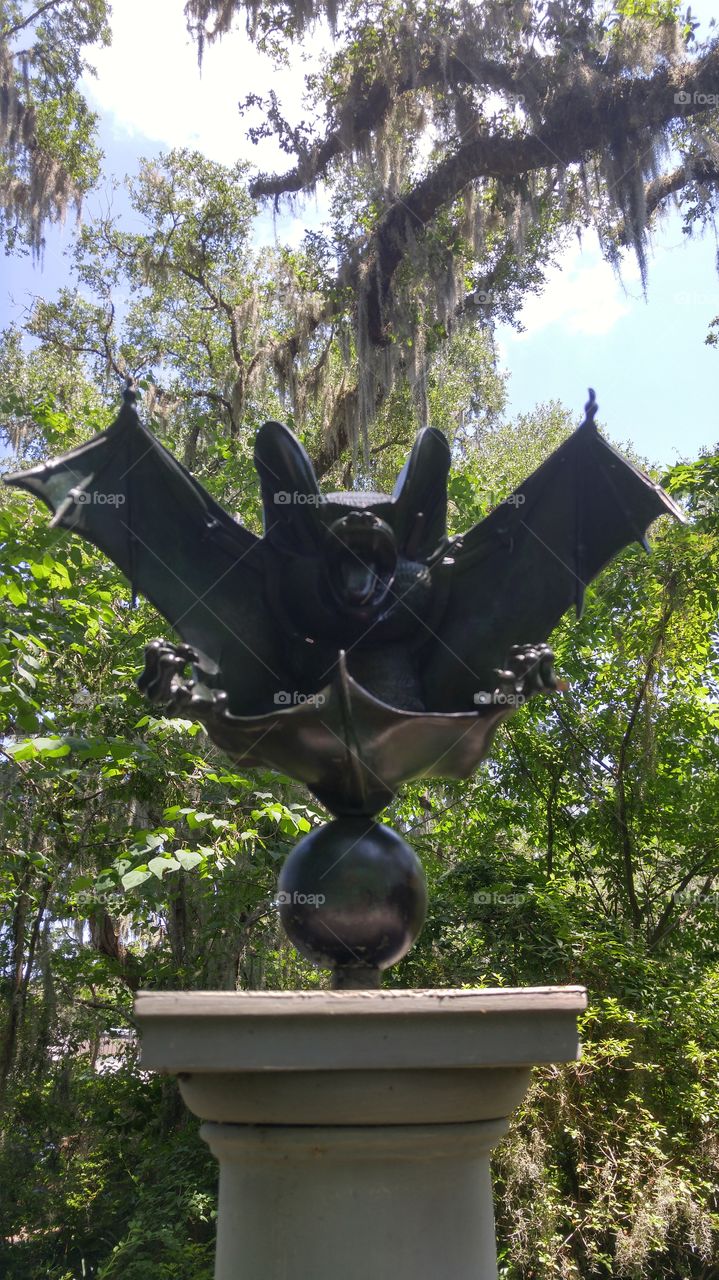 Spooky sculpture of a bat at Brookgreen Gardens in South Carolina