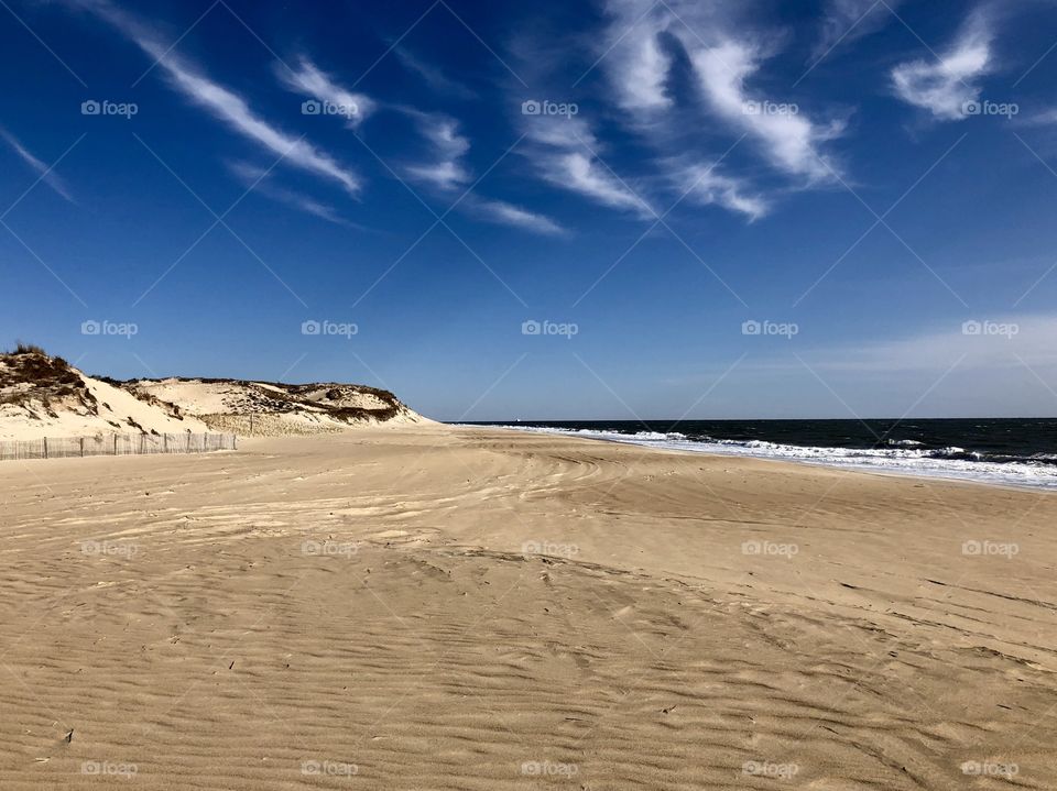 Cold spring morning on the beach on Cape Henlopen, DE. Good view of the dunes