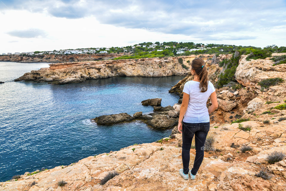 Girl looking at the sea