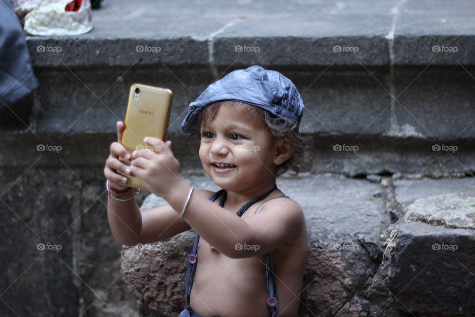 Boy using mobile phone