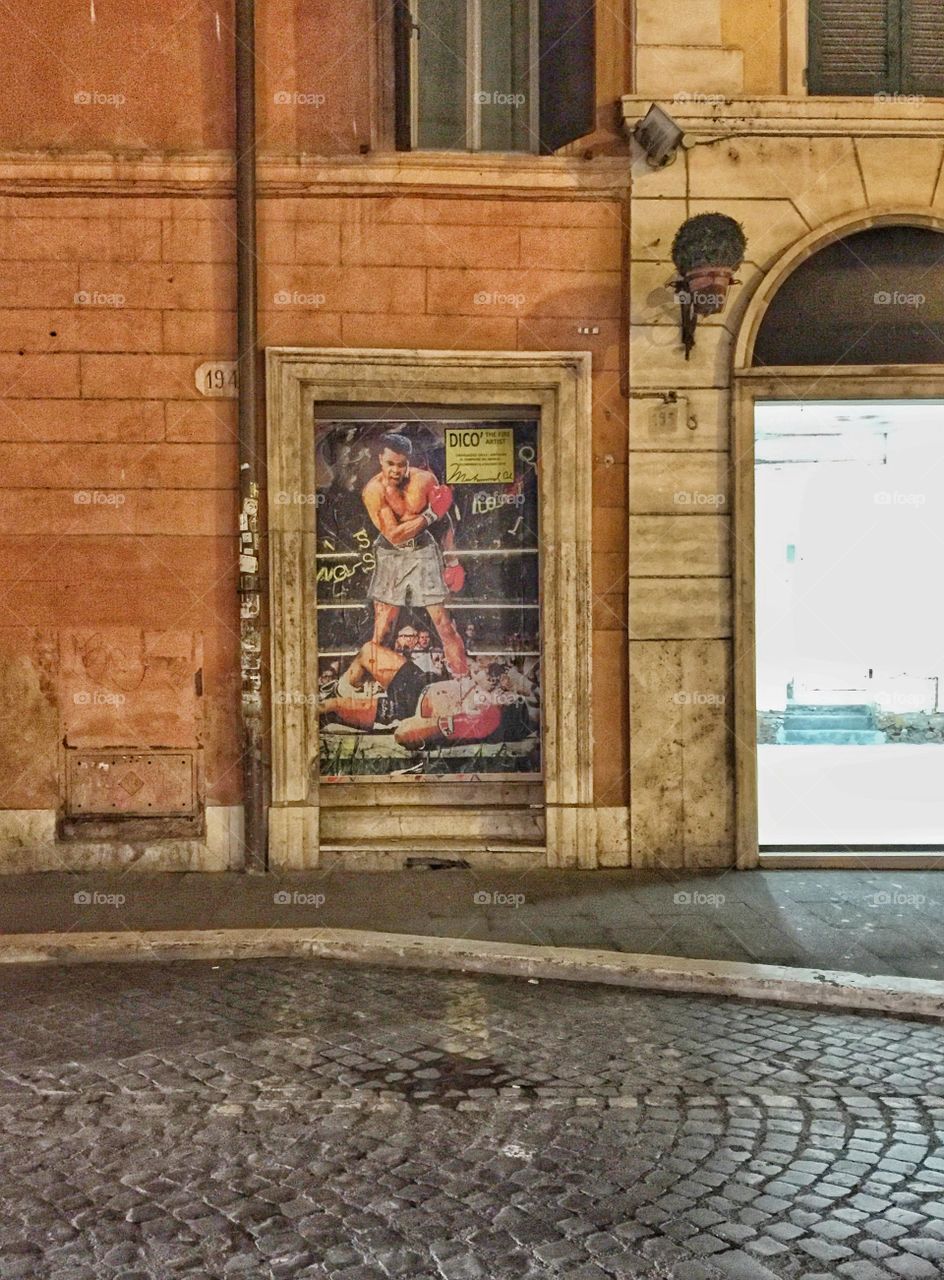 Mohamed Ali poster on Roman street