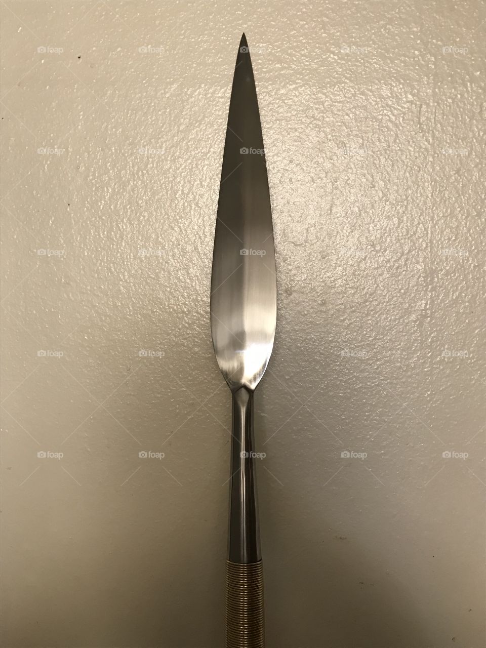 My handsome Zulu Iklwa. An ideal short spear for exercising and martial arts training. Unleash yourself when raising this bladed arm in the air and doing the battle cry, “Zulu! Zulu! Zulu!”