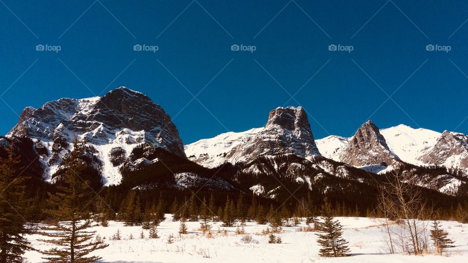 This is a picture of the Three Sisters. They are part of the Rocky Mountains