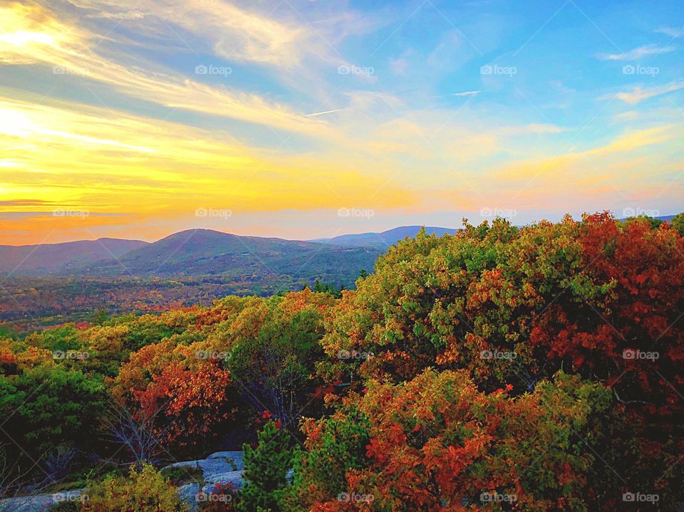 I shot this scenic view of Fall foliage and a glorious sunset while on top of Mount Battie in Camden, Maine.
