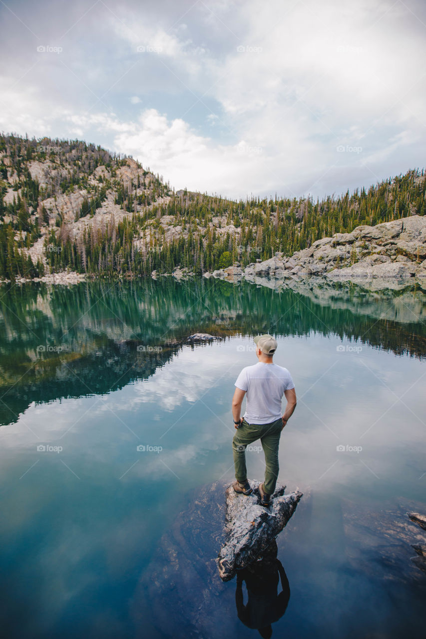 Man enjoying a beautiful view after a hike