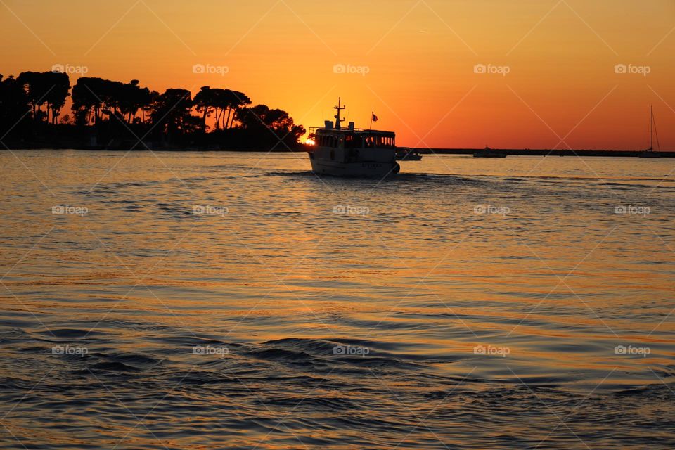 Sonnenuntergang in Poreč, Istrien, Kroatien