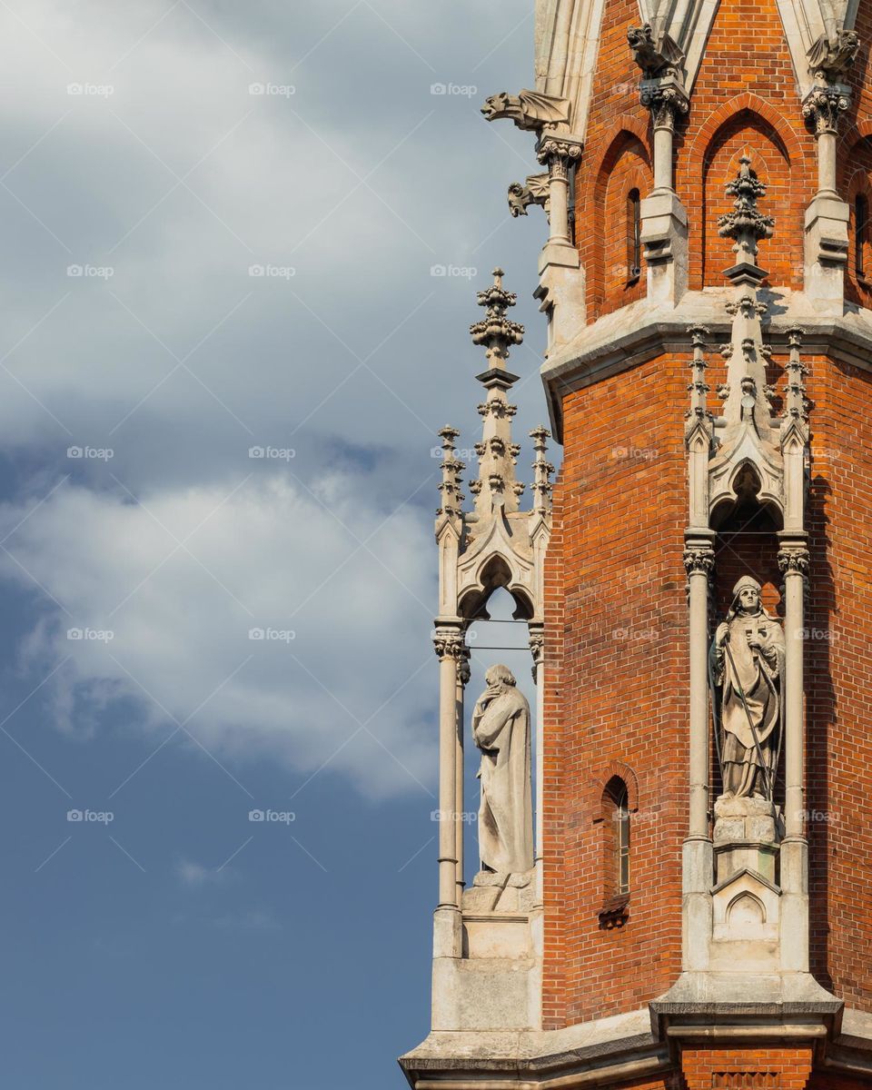 tower of the church of St. Joseph against the blue sky