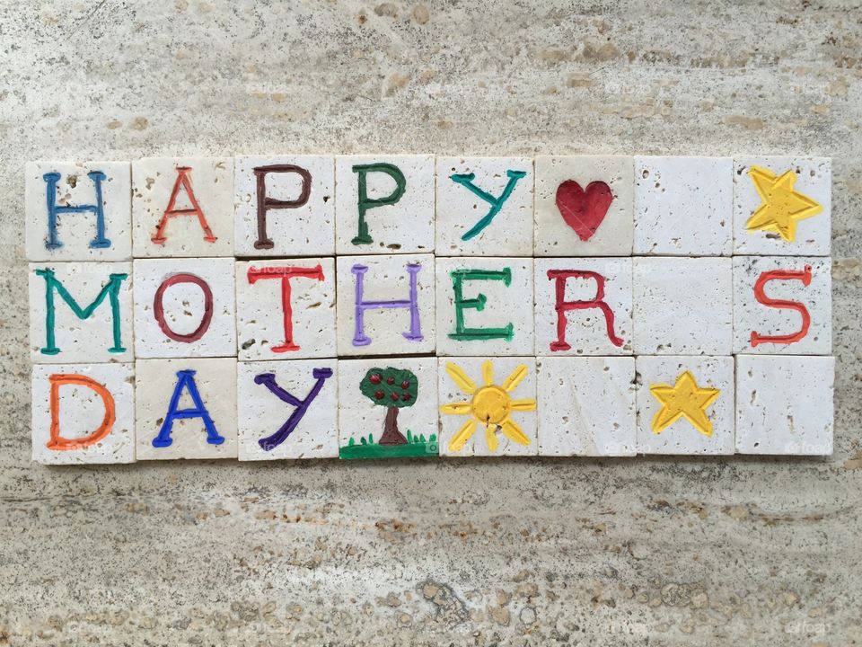 Happy mother's day message on carved travertine letters