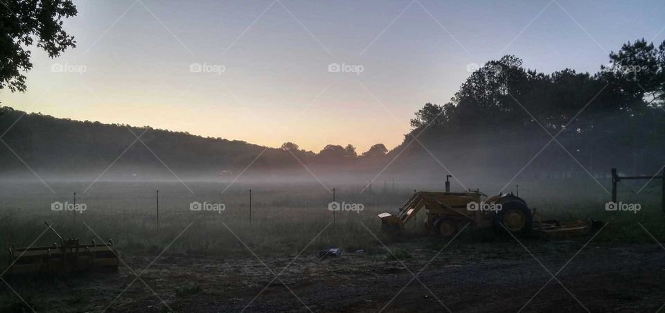 old tractor at dawn