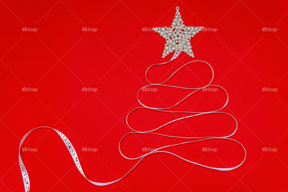 Christmas tree made of white ribbon