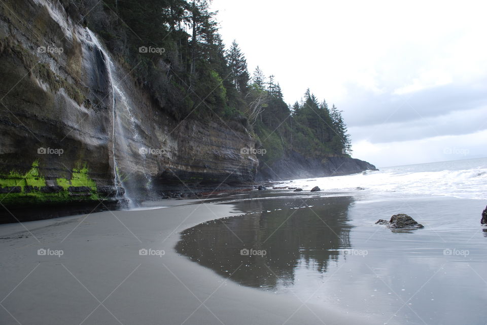 Scenic view of cliff at seaside