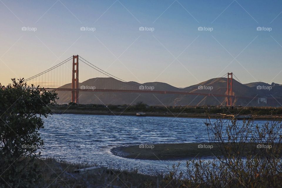 Golden Gate Bridge on a perfect evening at sunset. 