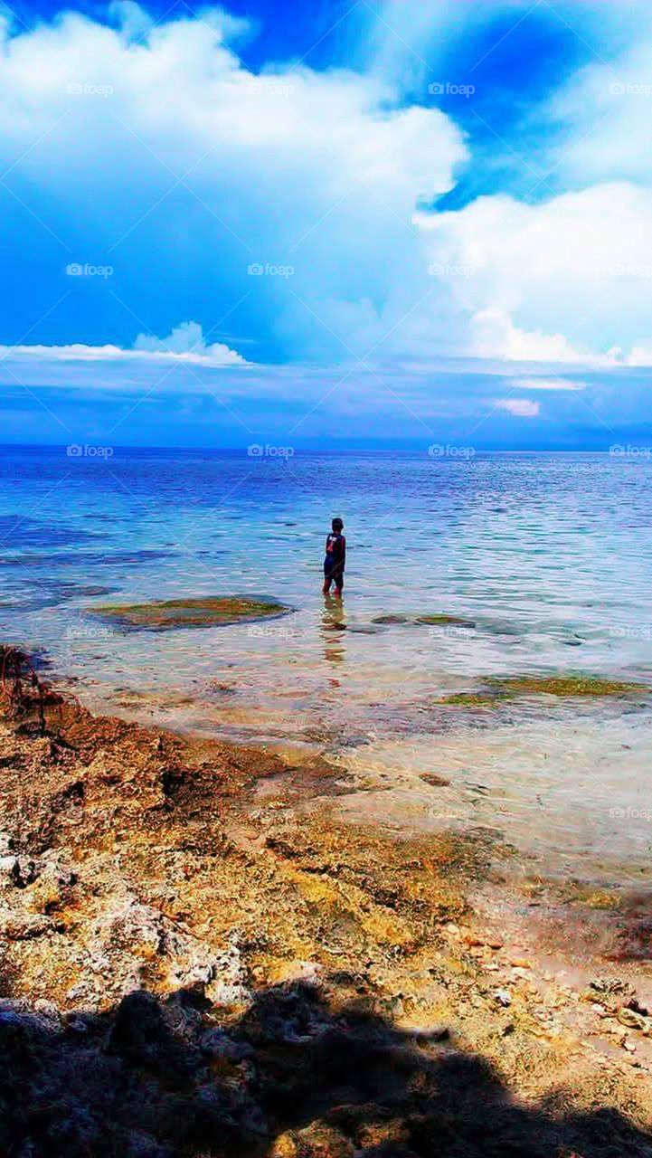 Explore nature adventure by the seaside of Siquijor Island in the Philippines. Sunrise till sunset full up your eyes with fascination of it's blue water,white/blue sky and white sands with colorful pebbles and rocks.It's more fun in Asia,let's go Philippines.