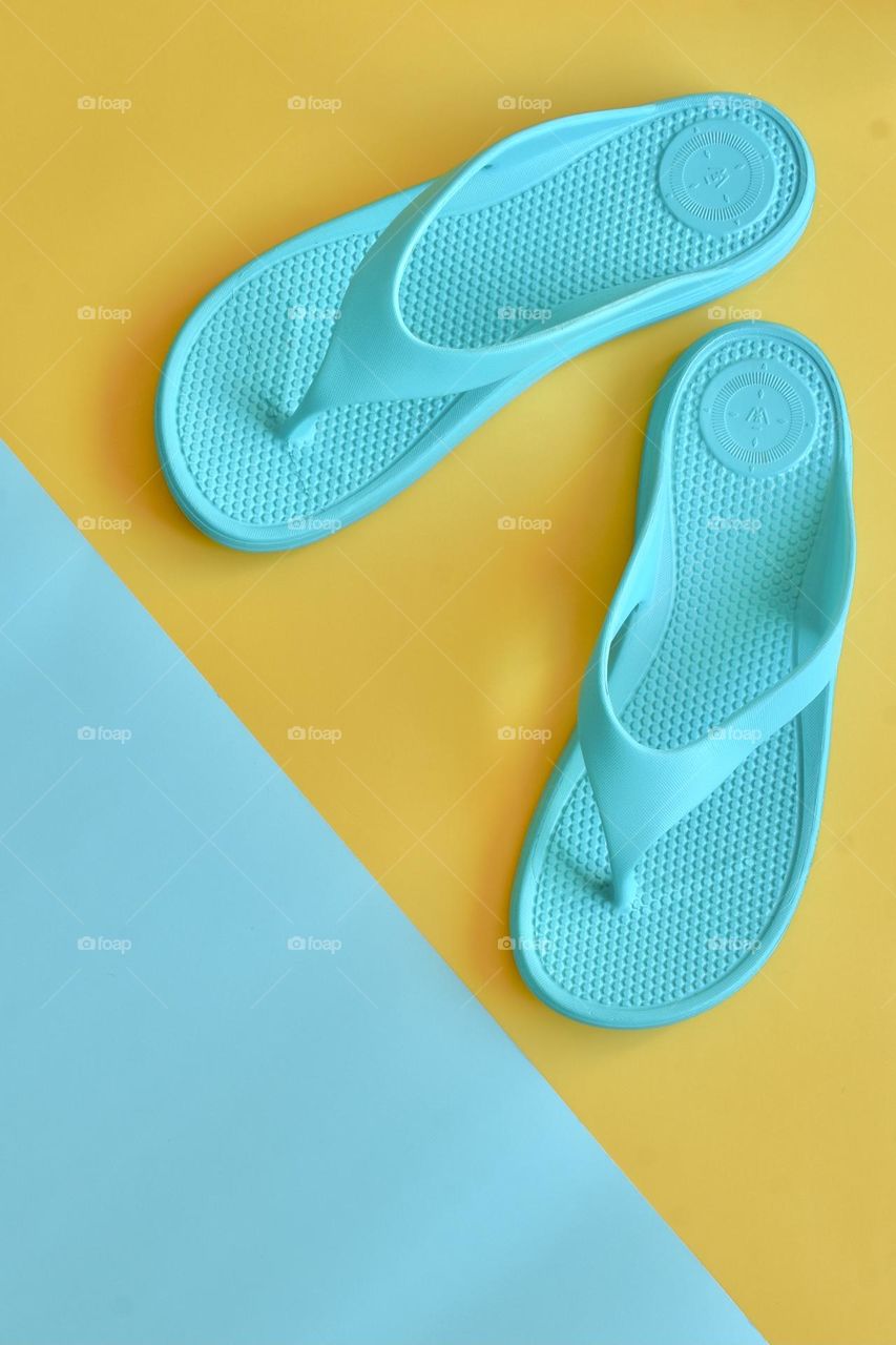 Flat lay of flip flops 