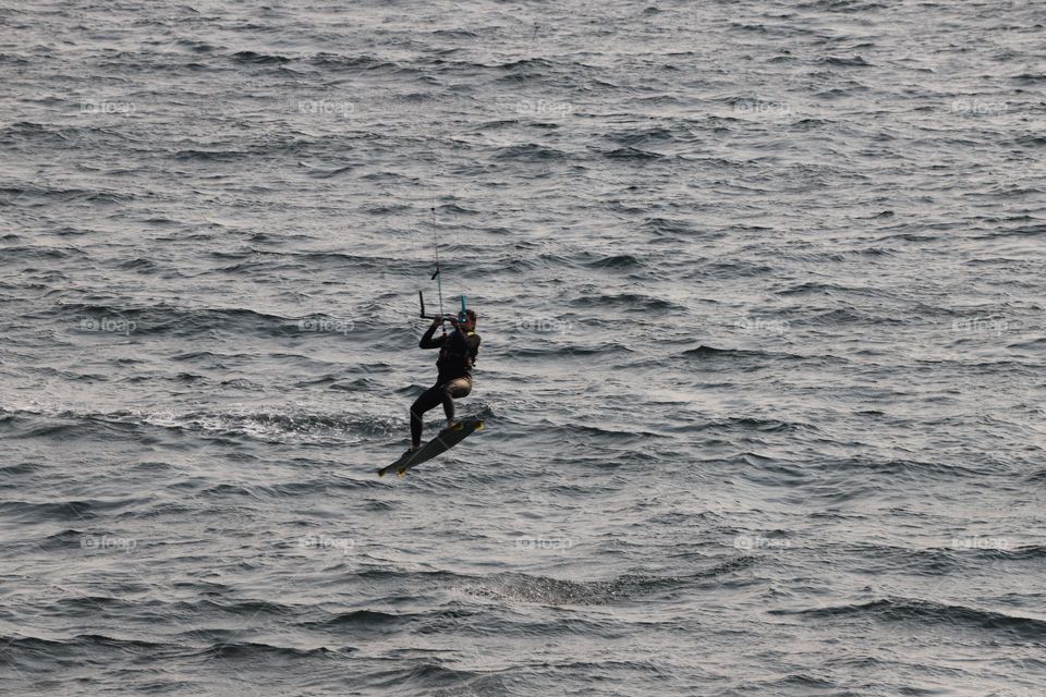 Windsurfer jumping