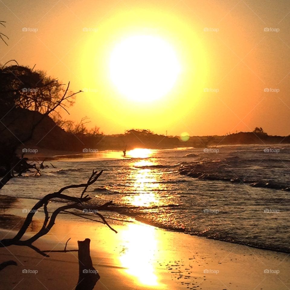 A sunset. A sunset on the beach