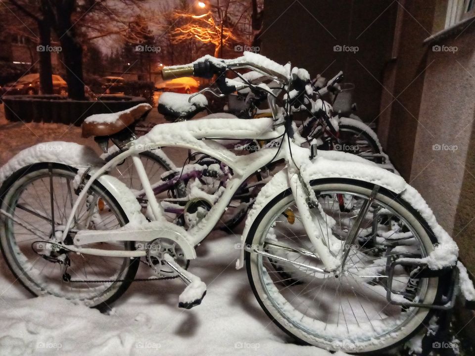 Much snow on a bike in winter