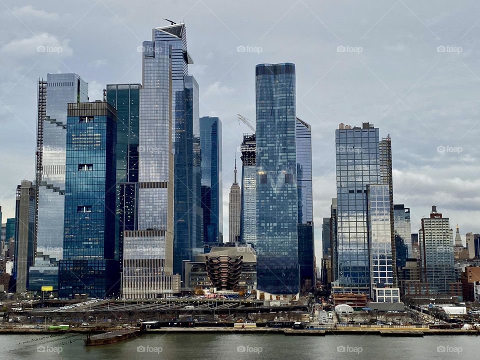 The New York City skyline at night viewed from the Hudson River