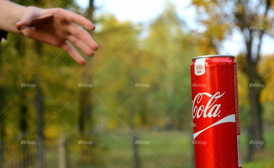 coca cola and hand girl outdoor