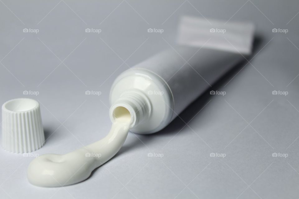 white paste tube