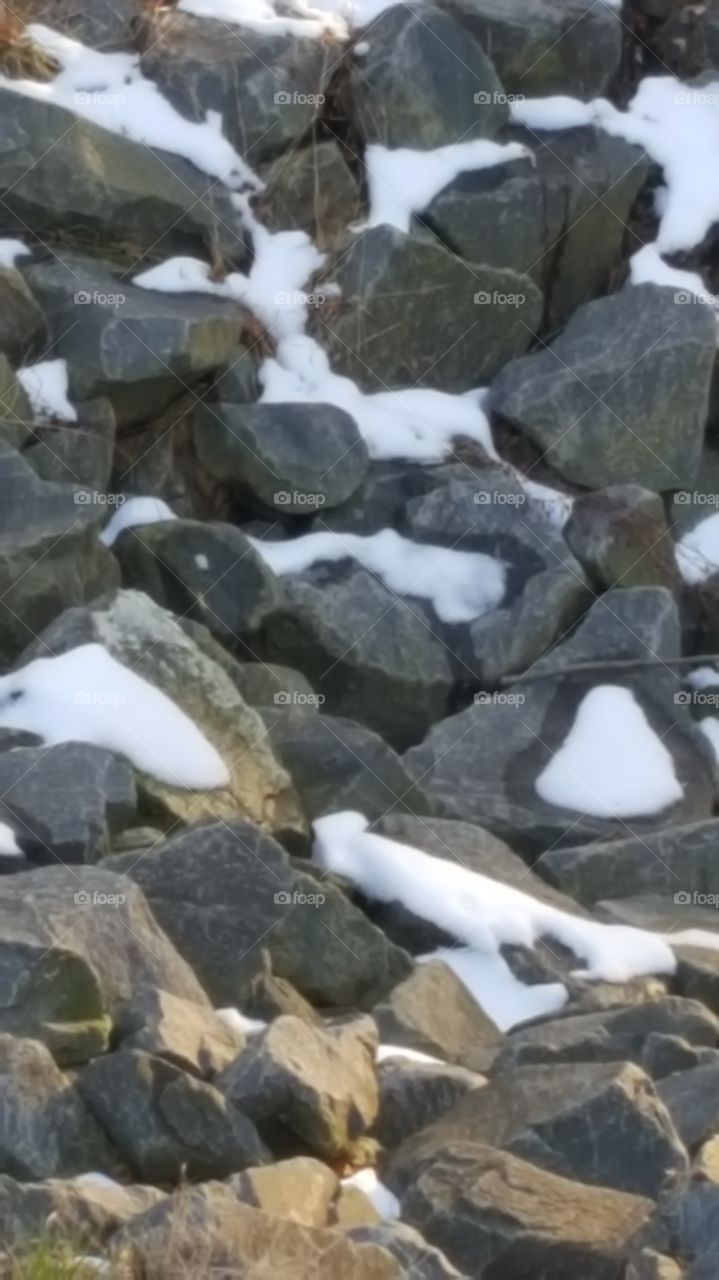 rocks with snow on them