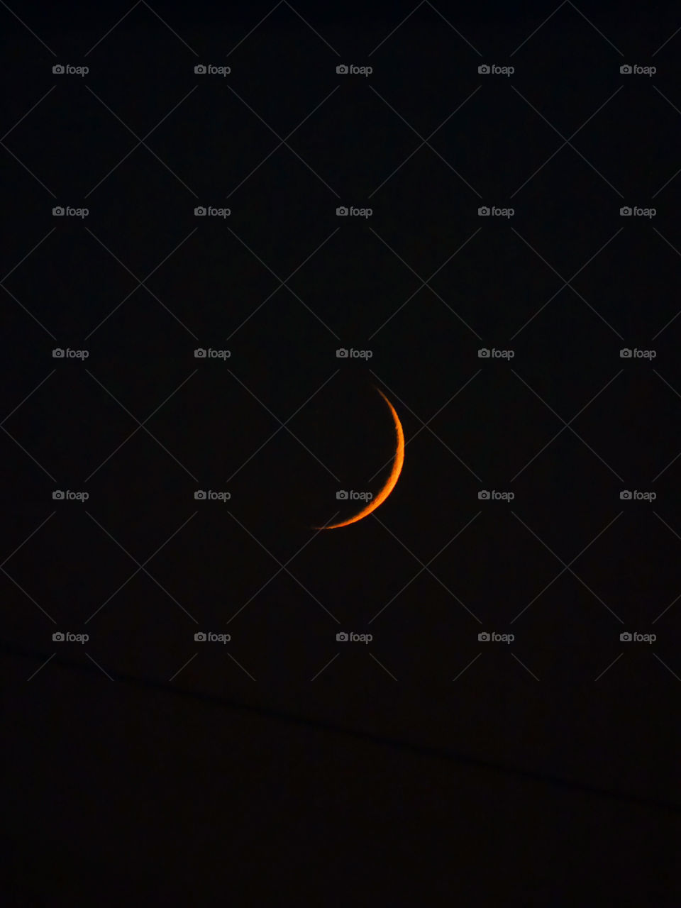 Red crescent moon in sky - saturation