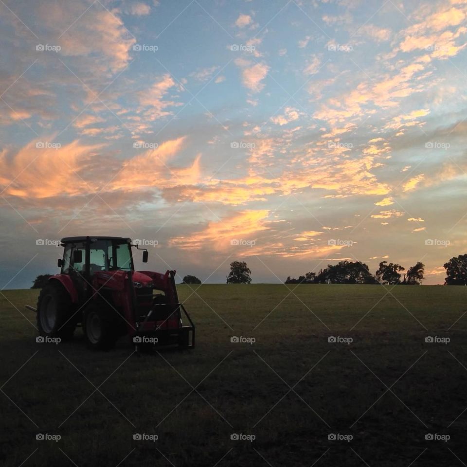 tractor sunset