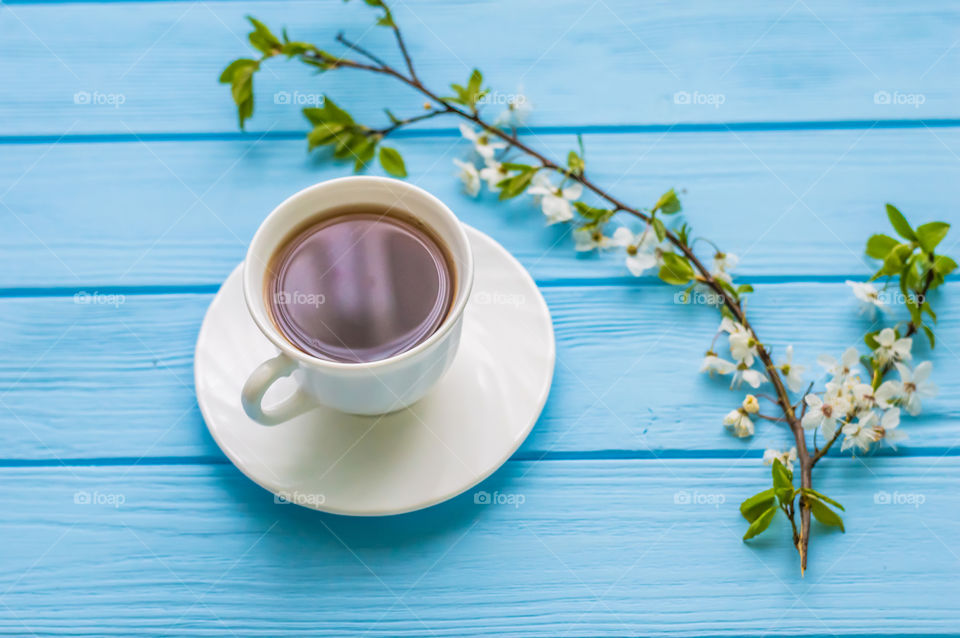 Blossom with tea cup