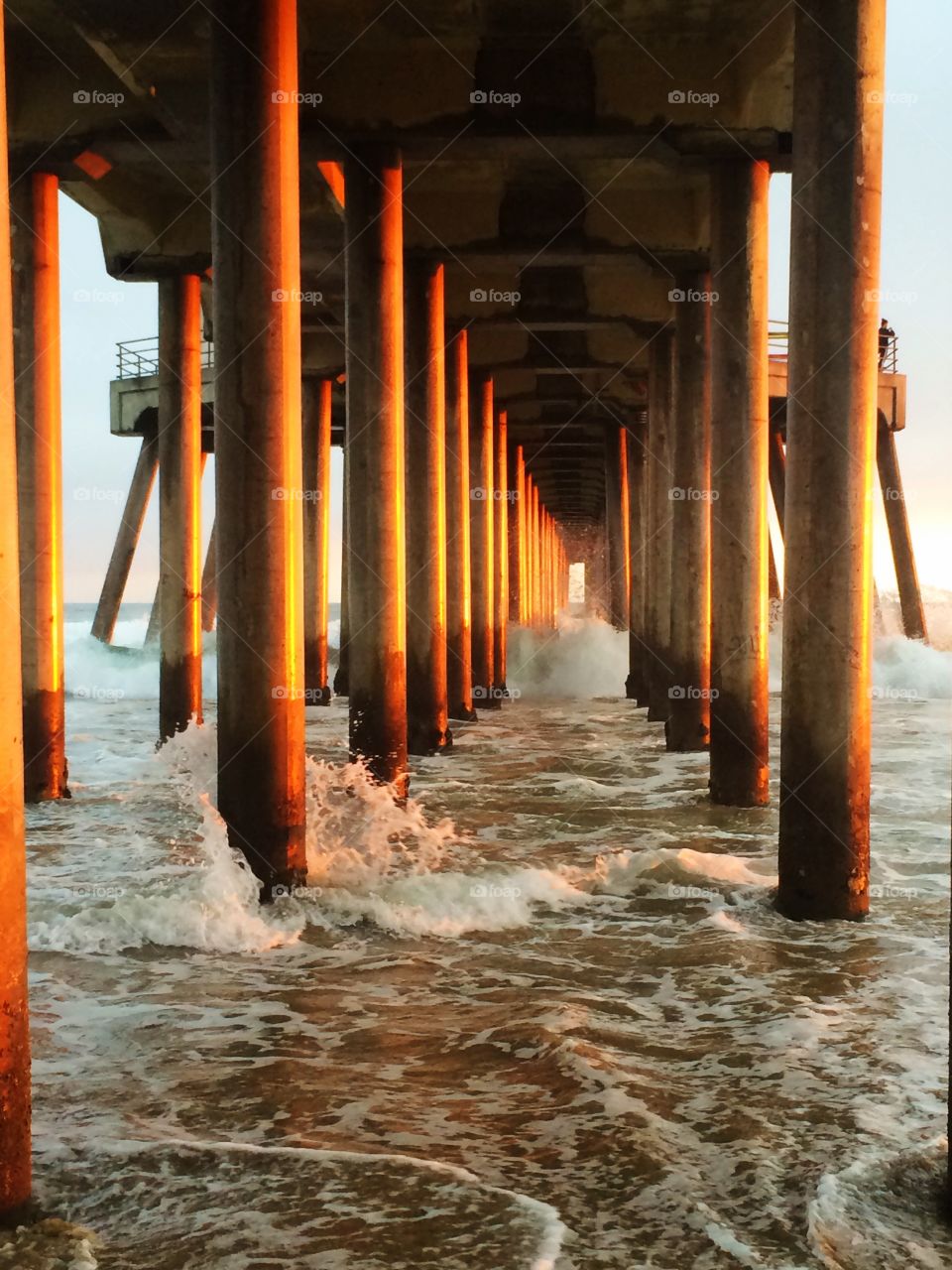 Pier Pressure. Sunset under the Pier in Huntington Beach, CA.