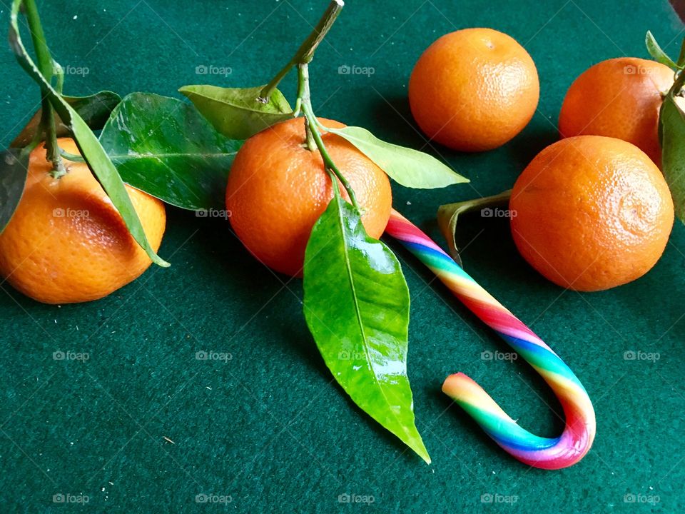 Mandarins on a green cloth - a remembrance of the New Year