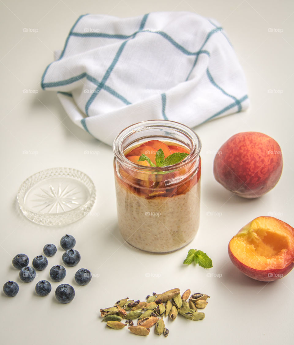 Peach blueberry and cardamom pudding