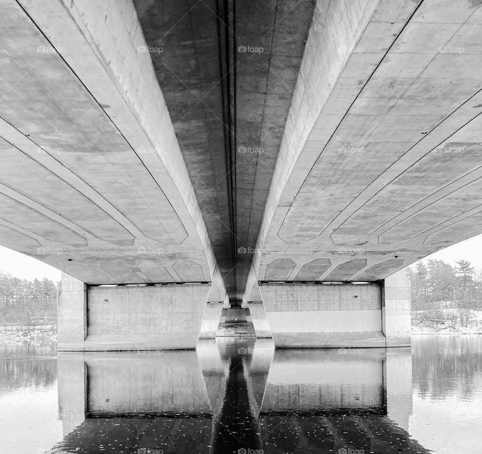 Reflections under a bridge downtown.