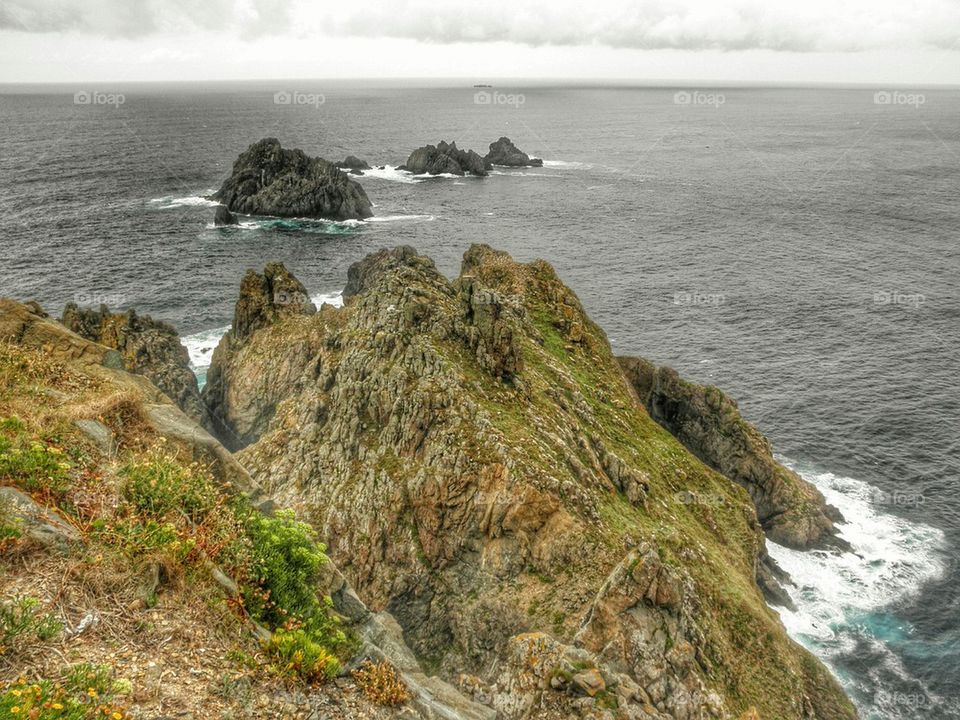 View of cliff in sea