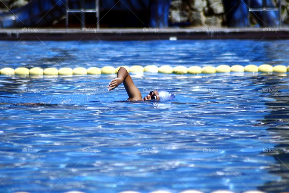 a swimmer in a swimming pool