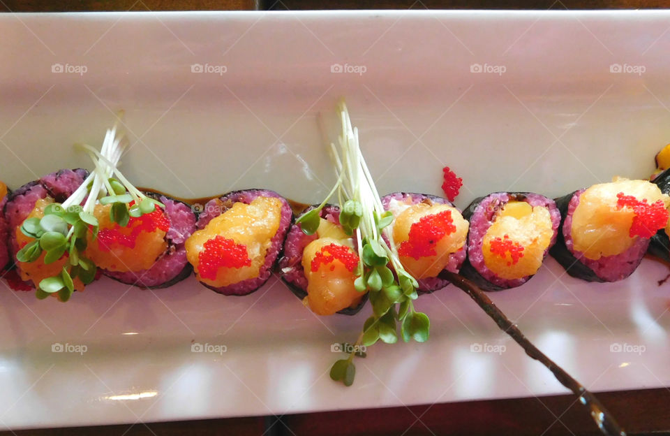 Exotic Asian Cuisine: Spicy Tuna Sushi topped with caviar!