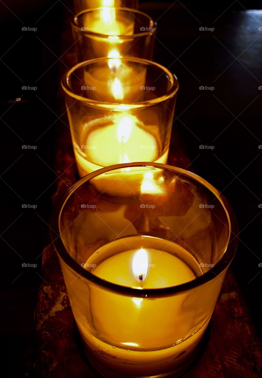 Two candles on a table