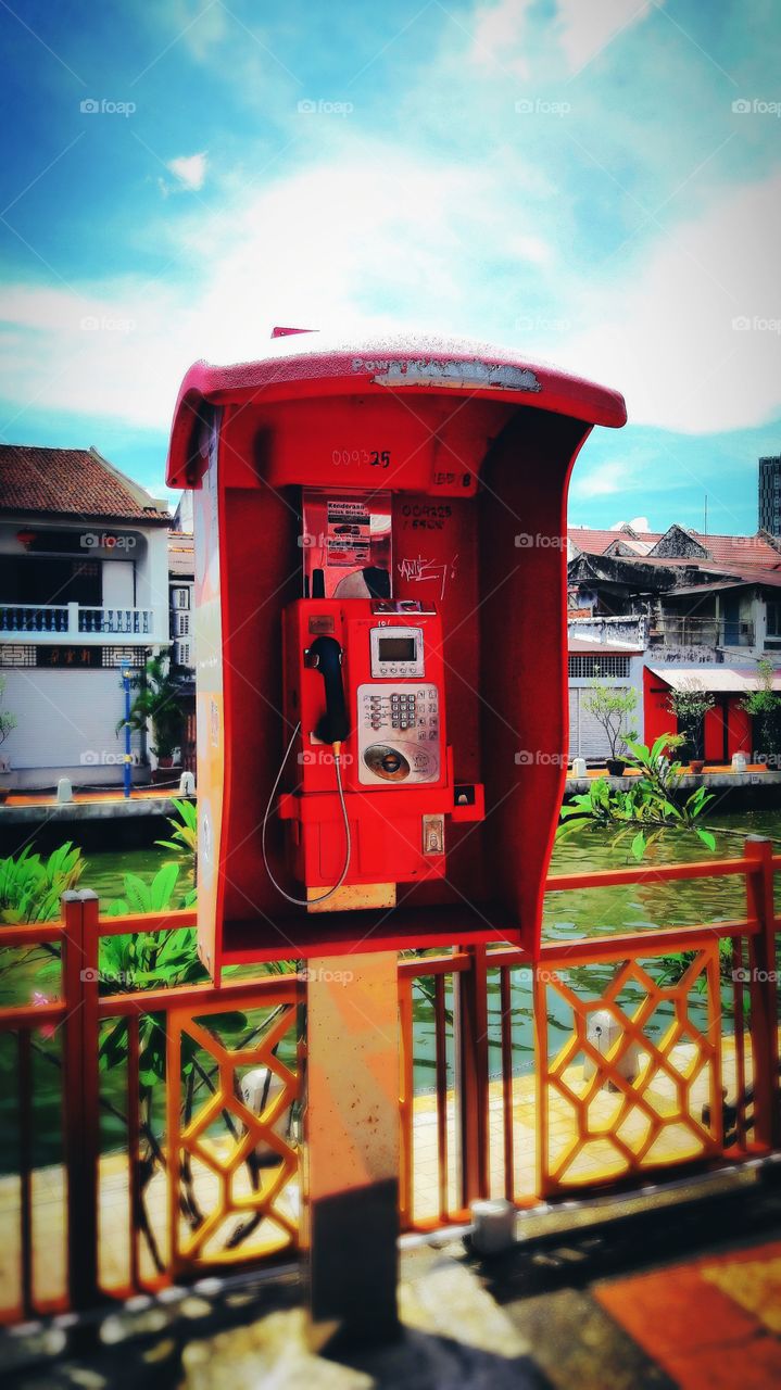 Close-up of red public telephone