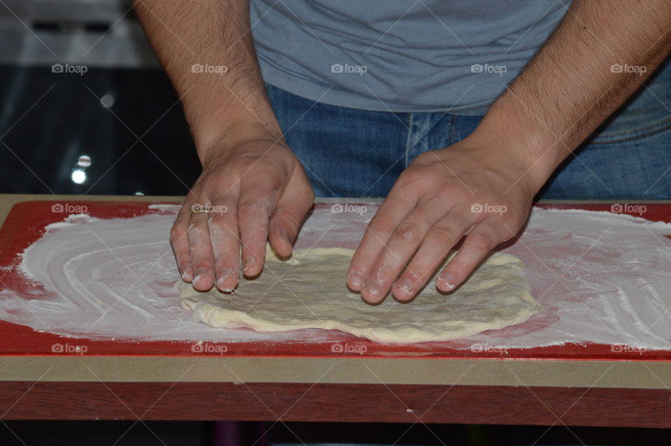 preparing homemade pizza