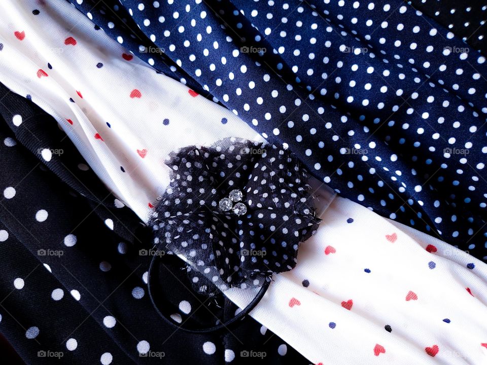 Polka-dot clothing and hair accessories from my closet.