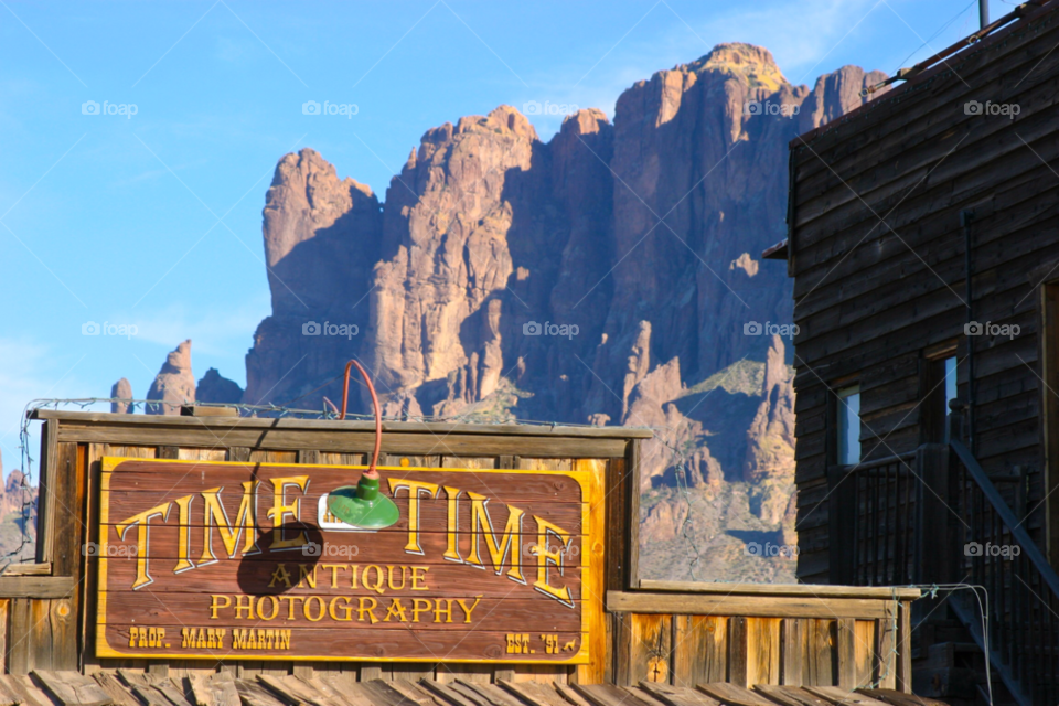travel sign mountain town by cmosphotos