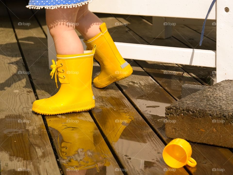 Child yellow rain boots