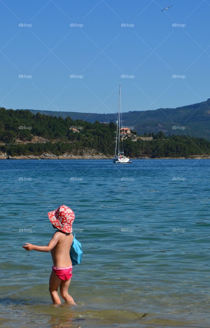 Little girl on the beach