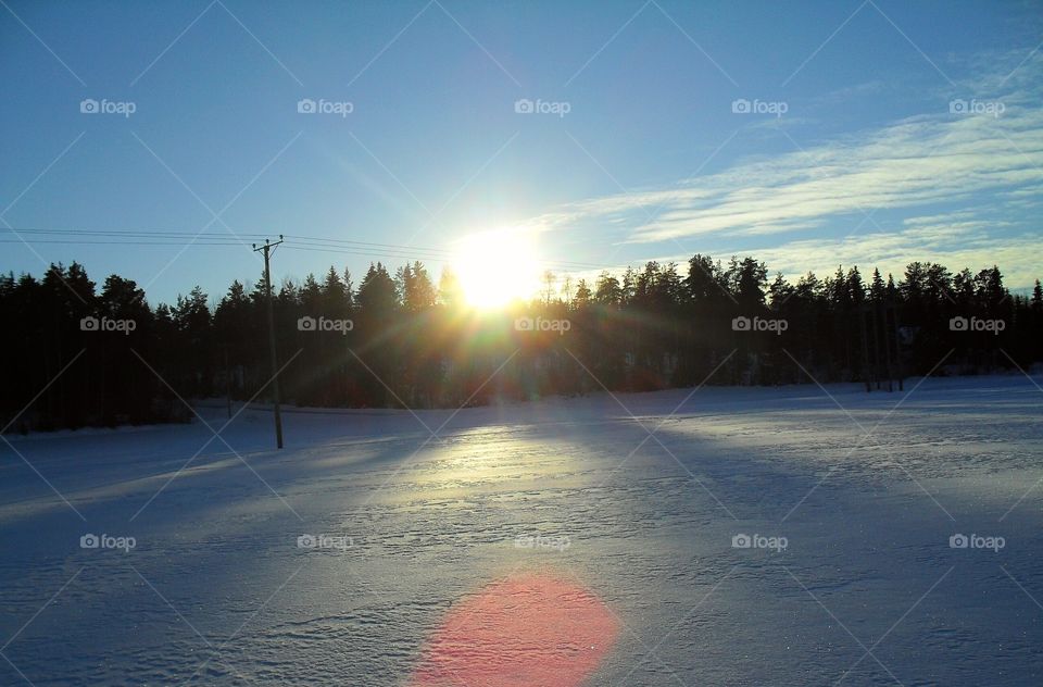 Sunset in finland during the winter