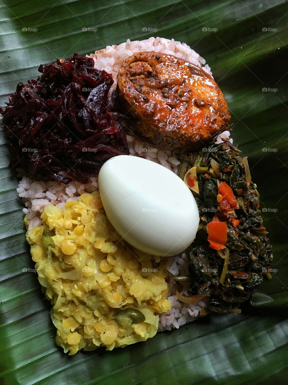 Sri Lankan lunch menu . Rice and curry .