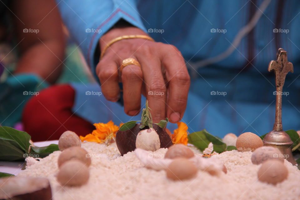 Close-up of areca nuts on rice during wedding