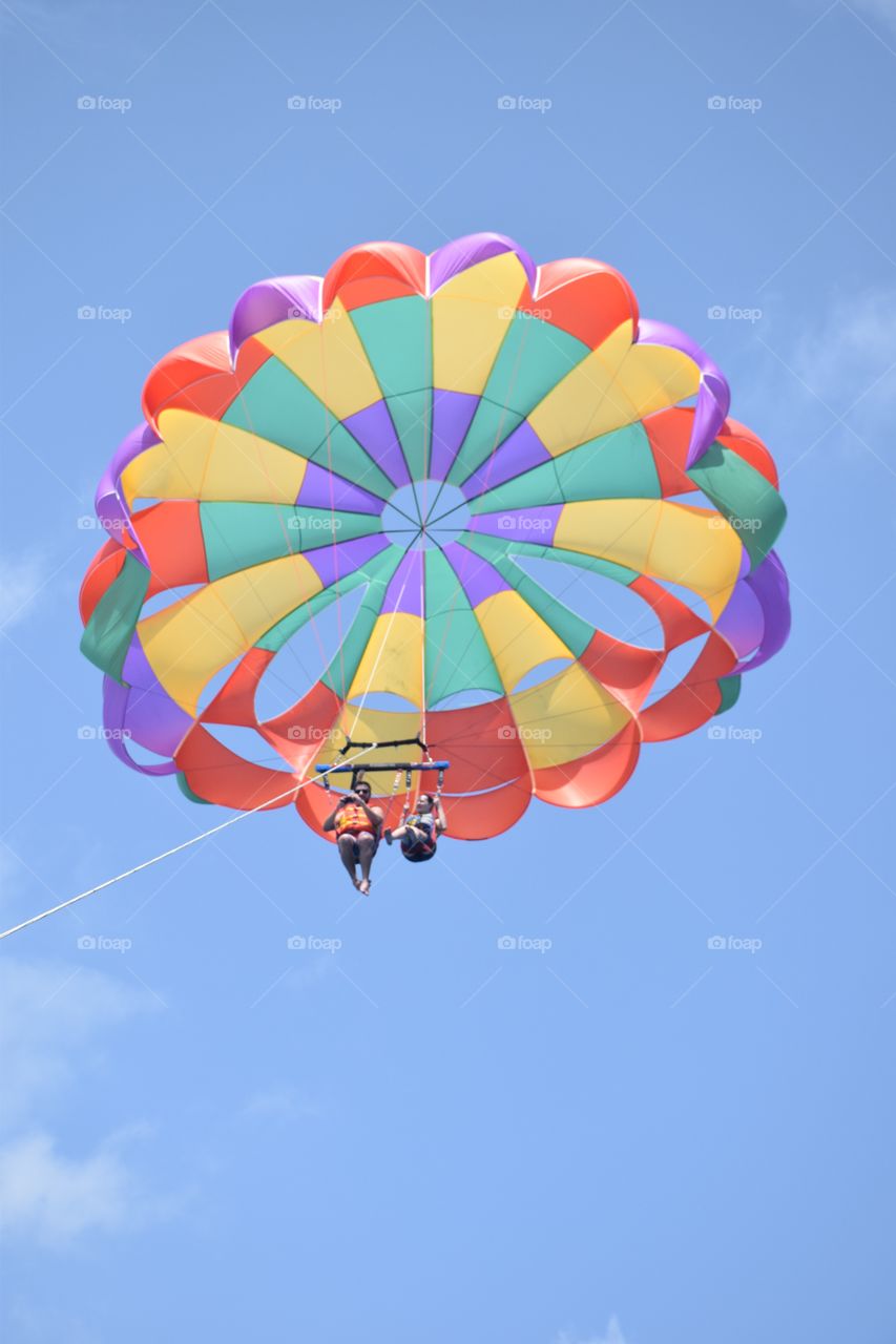 Couple doing parasail, San Andres, Colombia
