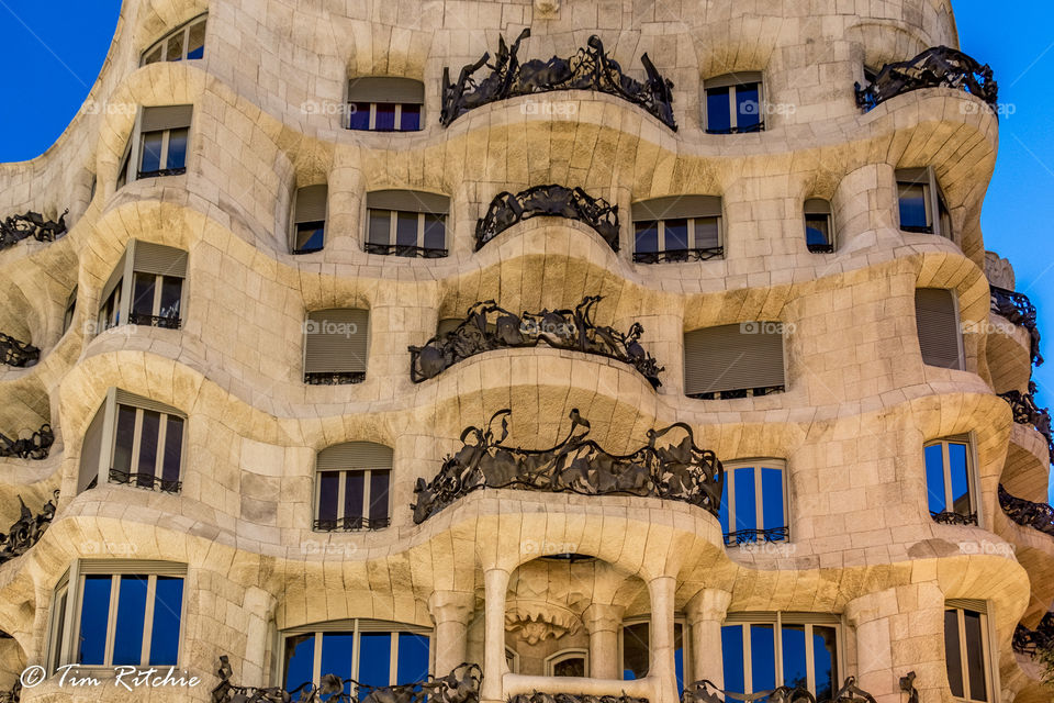 Gaudi’s Casa Mila caught in morning light. Uptown Barcelona, Catalunya, Spain