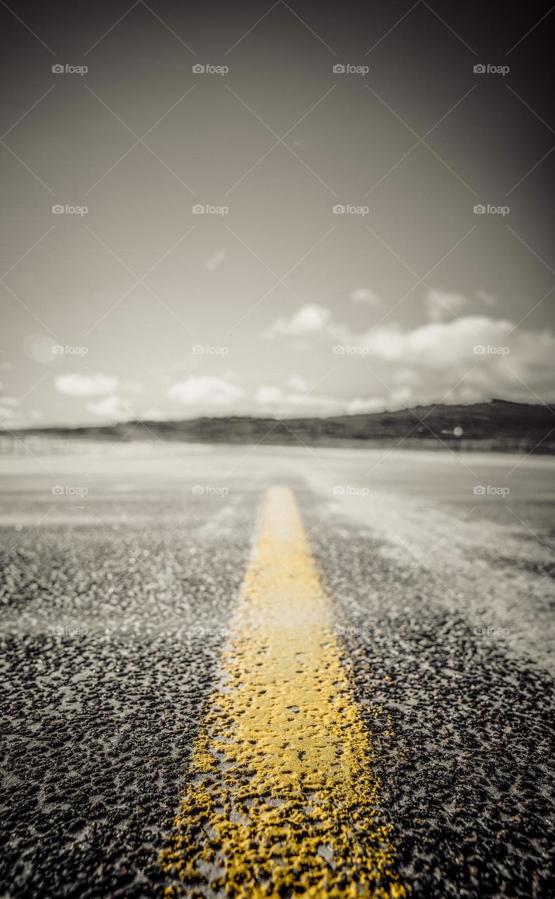 Snow drifting across the street.